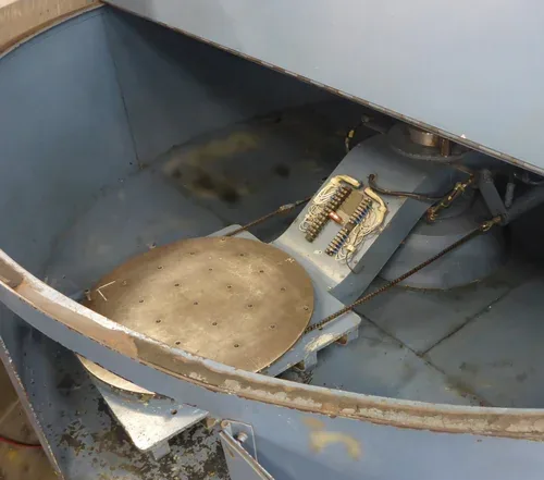 Centrifuge with circular mounting plate and slip-ring wiring