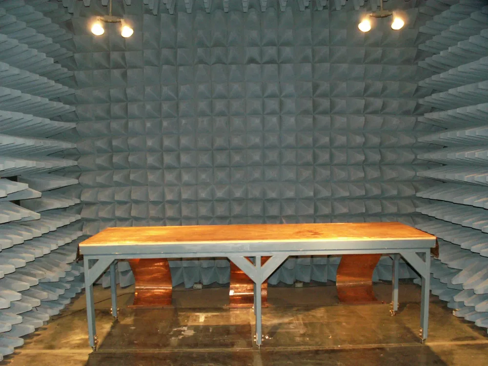 Semi-anechoic shielded chamber with ground-plane test bench