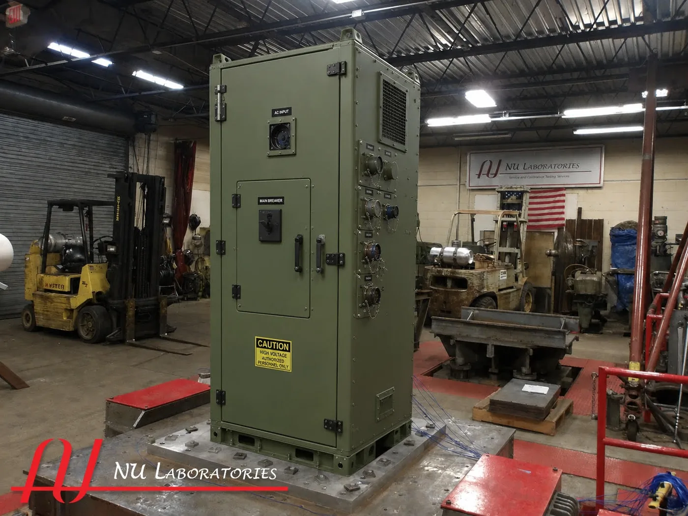 Military equipment cabinet fixtured and instrumented for vibration testing at NU Laboratories